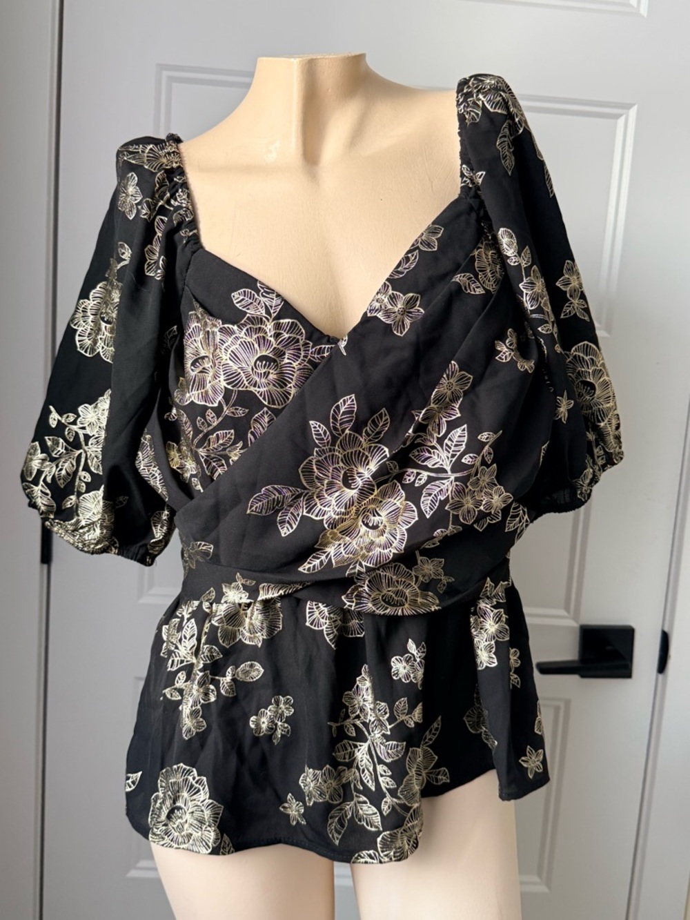Black Floral Puff-Sleeve Wrap Blouse with Gold Accents